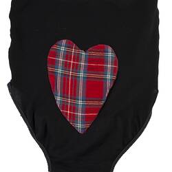 Black women's briefs with red tartan heart sewn on the rear.