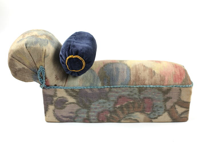 Toy chaise longue, patterned fabric.