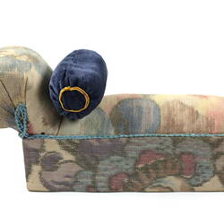 Toy chaise longue, patterned fabric.