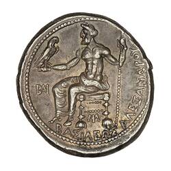 God Zeus seated facing left on throne holding eagle in extended right hand and sceptre in left. Text below.