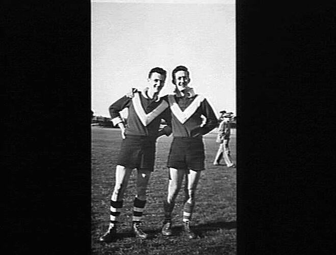 FOOTBALL: DEAN HART (CHECKERS) AND JIM JACKSON (HEAD OFFICE) PLAYED FOOTBALL FOR SUNSHINE HARVESTERS AGAINST FLINDERS NAVAL DEPOT AND OBVIOUSLY ENJOYED IT: `SUNSHINE REVIEW': NOV 1950