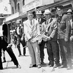 Negative - Group of Men Holding Golden Eagle Nugget, Kalgoorlie, Western Australia, Jan 1931