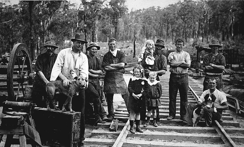 Workers and children in the Nowa Nowa rail yards, circa 1915.