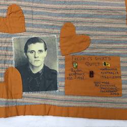 Detail of striped quilt. 3 sewn on hearts, fabric photo of man and patch with text.