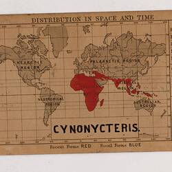 Retangular brown card with black and red text and map