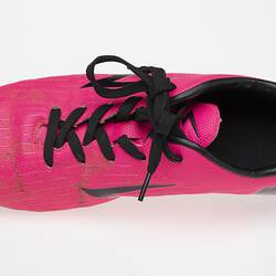 Pink Australian Rules football boot with black bootlace, lining and sole.