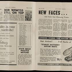 Open magazine with white pages and black printed text and images.