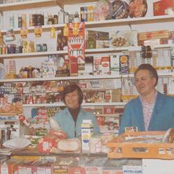 Digital Photograph - Athanasia & Konstantinos Papadimitropoulos Behind Counter, K & A Pappas Australian & Continental Milk Bar, Preston West, 1978