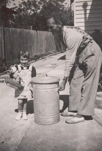 Digital Photograph - Girl Helping Dad Take out Rubbish, Deepdene, 1954