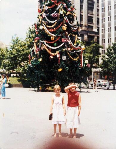 Digital Photograph - Two Girls Standing next to Christmas Tree, City Square, Melbourne, 1980