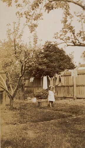 Digital Photograph - Girl by Clothesline, Backyard, Ivanhoe, 1945
