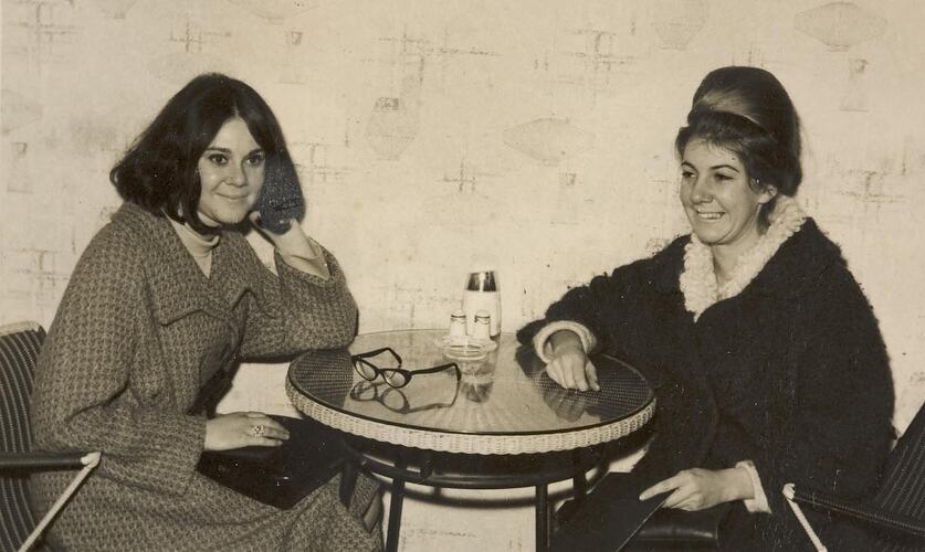 Digital Photograph - Two Women in Winter Coats, Sitting at Alicante Restaurant, Melbourne, 1964