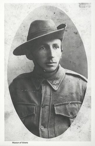 Head and shoulders portrait of man in uniform.