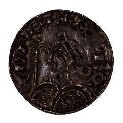 Coin, round, Diademed bust of King wearing armour with shield and sceptre in front facing left.