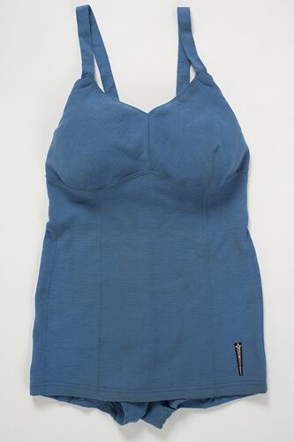 One-piece women's blue bathing costume.