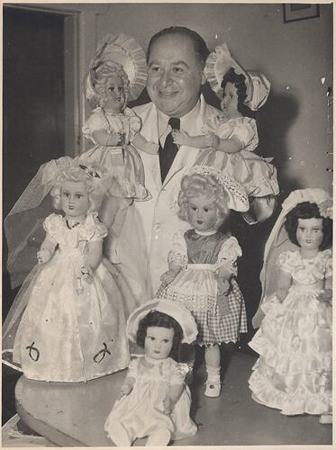 Photograph - L. J. Sterne Doll Co., Leo Sterne with Six Dolls in Dresses, Melbourne, Oct 1953