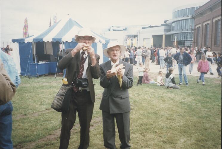 Photograph - Two Men Eating, Scienceworks Opening Ceremony, Spotswood, Victoria, 28 Mar 1992