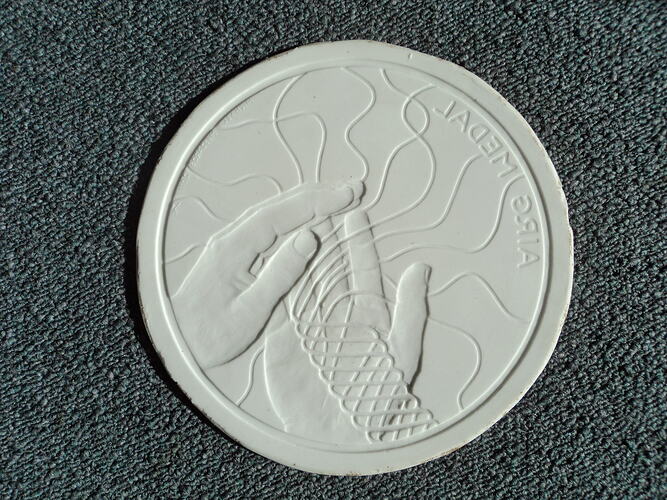 Digital photograph - rubber mould, AIRG medal