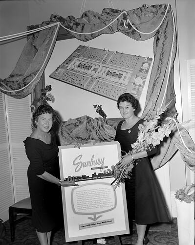 Paynes Properties Ltd., Two Women Modelling a Sign, Victoria, 02 Apr 1959