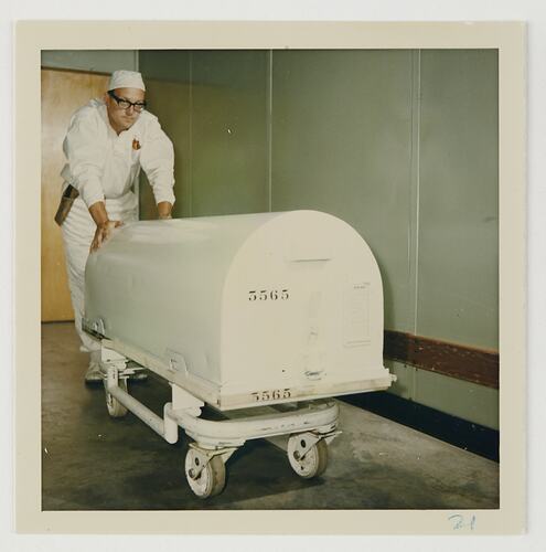 Slide 138, Worker Moving a Container, Kodak Factory, Coburg, 'Extra Prints of Coburg Lecture' album, circa 1960s
