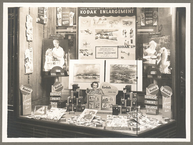 Black and white photograph of a display window.