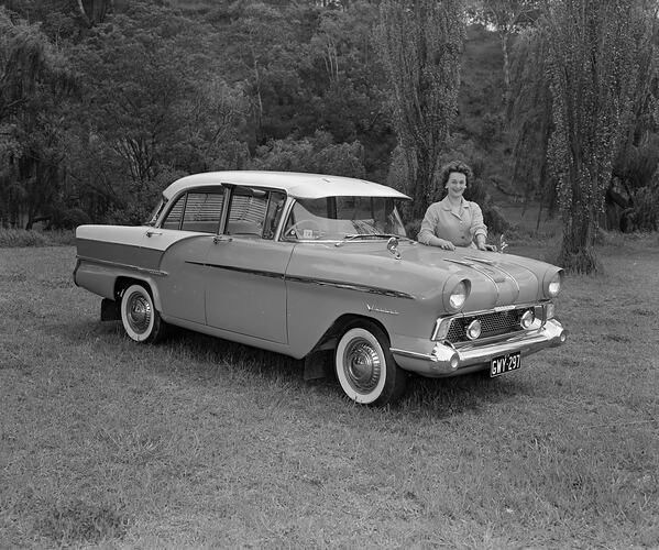 Woman with a Vauxhall Victor Motor Car, Melbourne, Victoria, Oct 1958