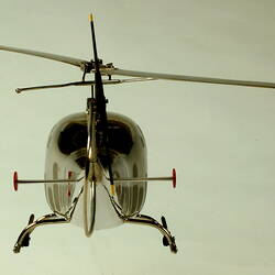 Chrome plated helicopter model. Rear view.