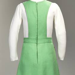 Back of lime green linen mini pinafore dress with zip.