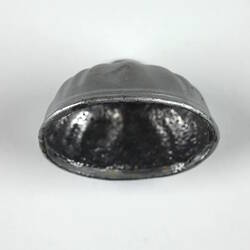 Oval silver toy cloche.