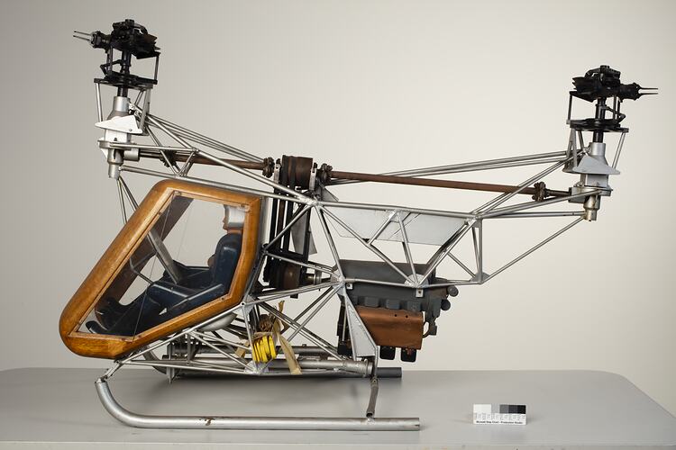 Model of a twin-rotor helicopter. Contains seated occupant.