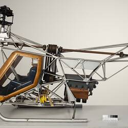Model of a twin-rotor helicopter. Contains seated occupant.