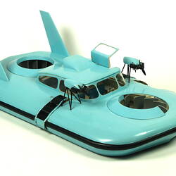 Light blue hovercraft with two propellers, three quarter view.