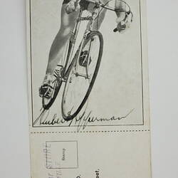 Photographic image of Hubert Opperman on a bicycle.