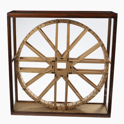 Wooden model of a water wheel. In case.