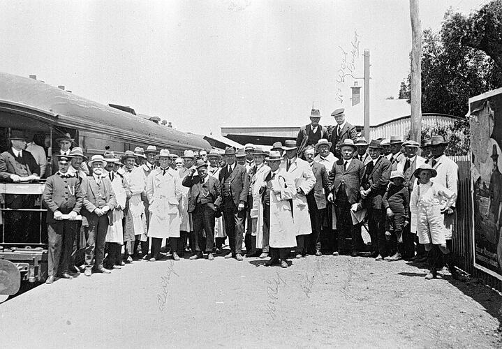 [People gathered for the visit of the Better Farming Train, Rainbow Railway Station, circa 1925.]