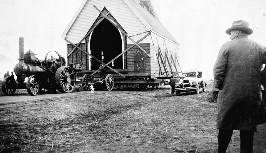 [A steam tractor moving a church, Minyip, 1935.]