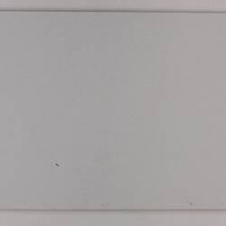 Rectangular white cardboard.