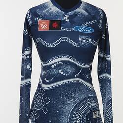 Women's AFLW guernsey with Indigenous pattern in navy and white. Lined and dotted design.