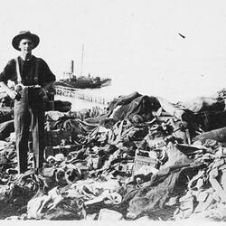 Soldier with discarded kit and weaponry, Gallipoli, 1915.