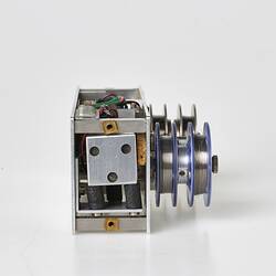 Small metal box with two reels. Profile.