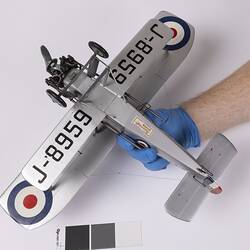 Model of silver aeroplane.