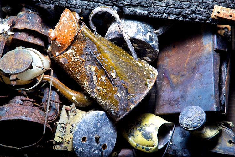 Digital photograph - Box of bushfire-affected objects, close-up, Healesville, Mar 2009.