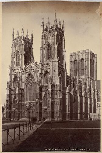 Cathedral exterior with two towers at entrance.