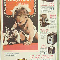 Advertisement for Kodak film showing a cat, a baby and some cameras