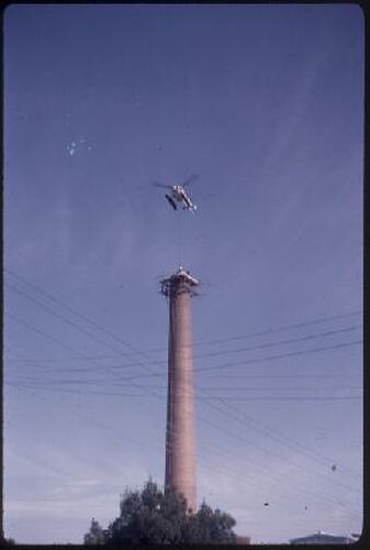 Slide - Helicopter Lifts Lid from Kodak Factory Chimney, Kodak Australasia Pty Ltd, Coburg, Jan 1974