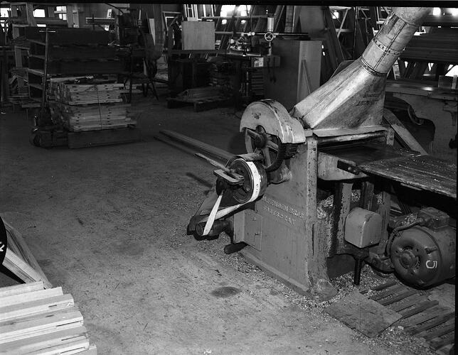 Monochrome photograph of a hoisery factory.