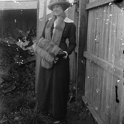Woman in Garden with Furs, circa 1900s