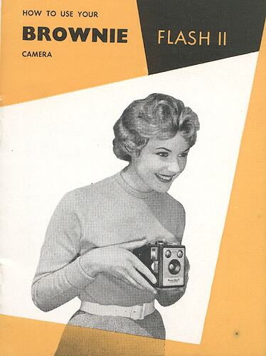 Cover page with photograph of woman using camera.