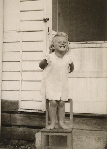 Susan Leech Standing on Chair in Her Back Yard, Frankston, circa 1954