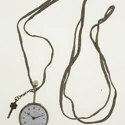 Gentleman's pocket watch in case and attached to silver plaited chain.